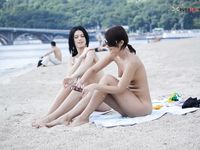 french Gal with petite bra-stuffers on tunisia strand
