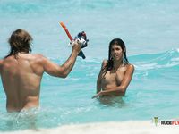 Two sisters are a nudist family ever since they know for each other, and they enjoy having fun and taking naked photos at the beach