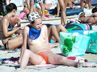 She goes out swimming, with her firm ass flashing, before her girlfriend with a smooth, shaved pussy joins the fun 2