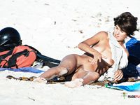 Curvy amateur brunette nudist caught by a voyeur on a hidden camera