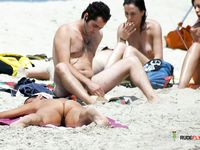 The naked beach seems like a perfect environment for two chicks who love showing their bodies to each other and everyone else