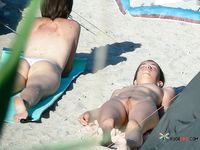 She has a tight body and perky tits while an older babe flaunts her thick curves