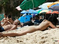 And then, she uses the sun cream to rub her sweet shoulders gently, and to rub her boobies, of course