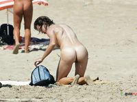 She enjoys body painting while showing off her perfect, smooth pussy and adorable, perky tits 2