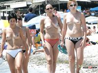 The lie topless outdoors, with their beautiful, perky tits on display