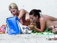 Nudist family caught on camera having fun at the beach