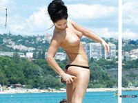 Pregnant cutie showers naked while dazzling blonde mommy talks on her phone nude as well