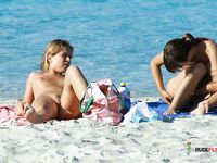 Stunning young brunette naturist secretly filmed topless by a voyeur