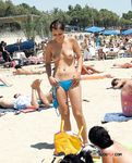 Younger and more mature ladies have fun at the beach topless, showing off their tits and curves