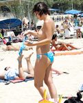 Younger and more mature ladies have fun at the beach topless, showing off their tits and curves