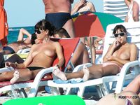 She doesn't care though and we see her shaved pussy