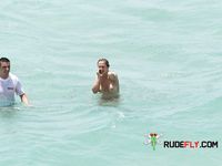 Topless slim hotties take turns showering with their perfect breasts on display 2