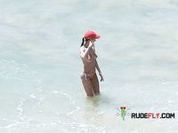 Topless slim hotties take turns showering with their perfect breasts on display 2