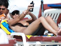 She gets secretly filmed as she lies down, with her big, natural breasts and bubbly ass showing