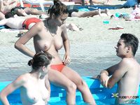 Green Foliage Frames a Naturist Conversation