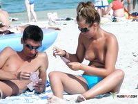Now she likes to be a nudist who drinks alcohol and smokes at the beach 3