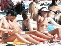 She gets caught on camera sitting naked and showing off her beautiful breasts 2