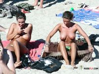 Purple Bikini Bottoms as She Meets the Rolling Beach Waves Topless