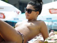 Stunning babe caught sunbathing naked by a voyeur 2