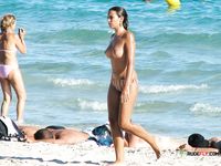 The girl lies down sunbathing with her hairy pussy and tiny tits on display 3