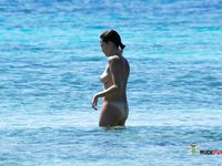 Short haired ebony babe with perfect tits and fit body is joined by her blonde girlfriend in nudist camp as they are enjoying their time in the sun