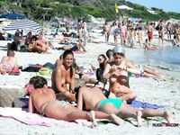 Patterned Bikini Bottoms on a Topless Beach Wader