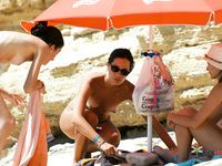 Two hot, horny sluts shaved their pussies before they came to a nudist beach, where they hope they'll find a whole nudist colony of men to fuck