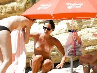 Two hot, horny sluts shaved their pussies before they came to a nudist beach, where they hope they'll find a whole nudist colony of men to fuck
