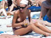 She flaunts her sensual and curvaceous body with beautiful, natural tits on a hidden camera