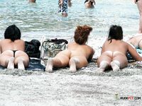 Then she also walks around the beach just so you can see her ass and titties