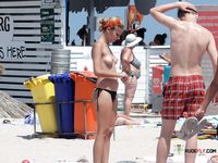 Pink Bikini Bottoms and Sunglasses on a Topless Beach Lounger