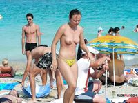 There's a stunning, nude beach girl with a slim body and beautiful, supple breasts, chubby hotties, and skinny cuties