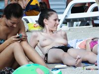 Two hot chicks are fearless of snakes ever since they went to a family nudist camp while they were s