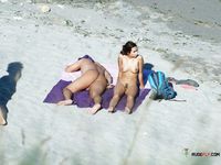 Two hot chicks are fearless of snakes ever since they went to a family nudist camp while they were s
