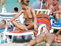 Playful nudist cuties have fun at the beach 2