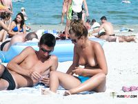 Warm Sun on a Colorful Towel With Green Bikini Bottoms