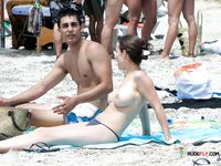 Topless Walk by the Waves in Colorful Bikini Bottoms