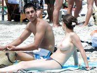 Topless Walk by the Waves in Colorful Bikini Bottoms