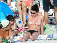 She flaunts her thick, seductive curves and a pair of massive, natural tits 2