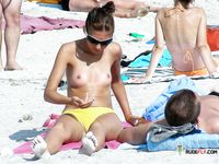 A Calm Naturist Stroll Along an Open Sandy Beach