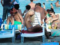 Slim nudist brunettes filmed by a voyeur getting ready to leave the beach 2