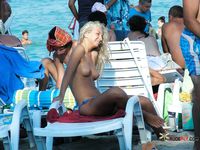 Slim nudist brunettes filmed by a voyeur getting ready to leave the beach 2