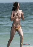 The girl is always topless, even on a regular beach, and her boyfriend doesn't mind that at all 3
