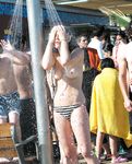 MILFs are waiting for their turn to take a shower in nudist colony while voyeur has enough time to film their curvy bodies and fat asses