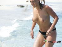 Dashing brunette gets caught on a hidden cam with her big, natural tits on display 2