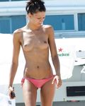 And then, she uses the sun cream to rub her sweet shoulders gently, and to rub her boobies, of course 2