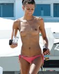 And then, she uses the sun cream to rub her sweet shoulders gently, and to rub her boobies, of course 2