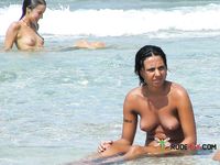 She gets filmed applying sunscreen on her slim body before showing off her perfect tits and hairy pussy 4