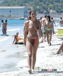 She gets filmed applying sunscreen on her slim body before showing off her perfect tits and hairy pussy 4
