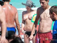 Nudist girl at a naked beach shows you her body 2